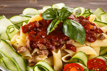 Pasta with meat, tomato sauce and vegetables