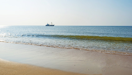 Fototapeta na wymiar Trawler fishing in the North Sea in summer