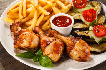 Grilled chicken legs with vegetables