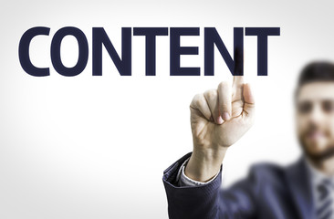 Business man pointing to transparent board with text: Content
