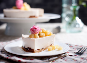 Rose flavor cheesecake  on a white plate