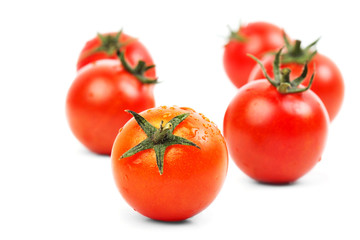 Fresh raw tomatoes isolated
