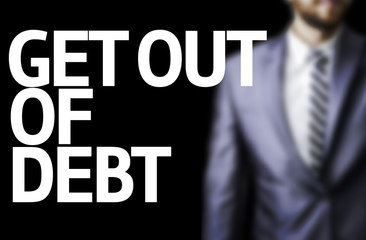 Get Out of Debt written on a board