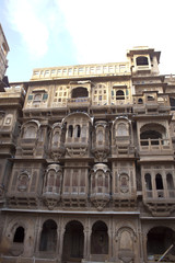 Fototapeta na wymiar Ornate facade of Haveli in the old town of Jaisalmer