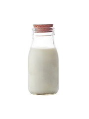 milk in bottle on white background