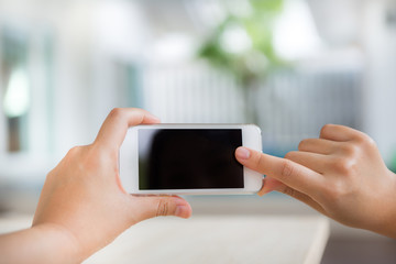 Hand touch the Screen on the Smart Phone