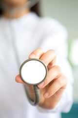 Doctor with stethoscope in the hands