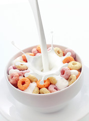 Bowl of colorful fruit loops breakfast cereal © exclusive-design