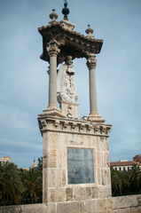 Fototapeta na wymiar Gothic statue on the bridge