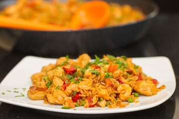 Paella on a plate, still steaming