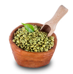 green coffee beans in wooden bowl