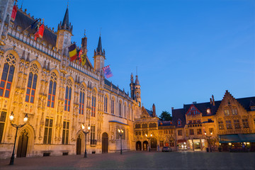 Fototapeta na wymiar Bruges - The Burg square and facade of gothic town hall.