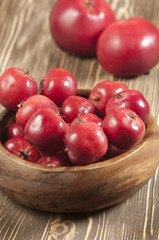 Red apples in a timber bowl