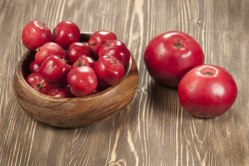 Red apples in a timber bowl