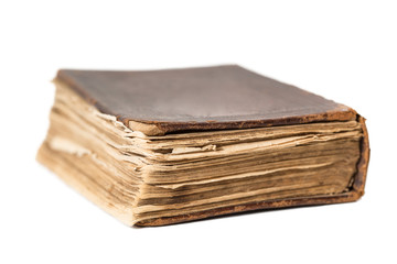 Closed old book. Isolated on white.