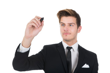 Businessman Writing On Transparent Screen
