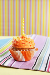 Tasty cupcake on table, close up