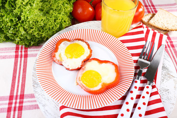 Scrambled eggs with vegetables and juice served