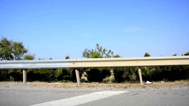 Side view of a Thesaloniki Greece road, fast driving
