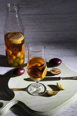 tasty summer drink with fresh fruits, on wooden table