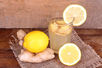 Ginger drink and ginger root and lemon