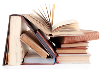 Books in a mess isolated on white