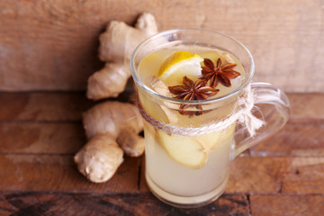Cup of ginger drink with lemon