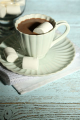 Hot chocolate with marshmallows in mug,