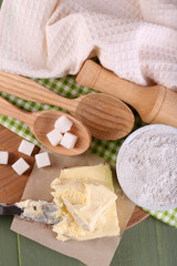 Components of cookies, on color wooden background