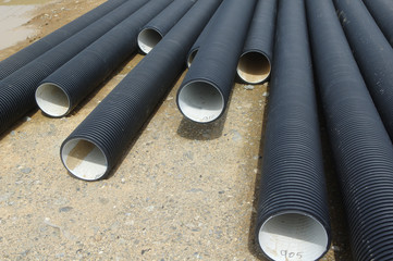 plastic pipes at a construction site