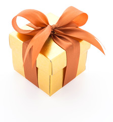 Gold gift box isolated on white background