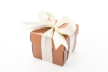 Gold gift box isolated on white background