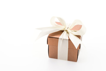 Gold gift box isolated on white background