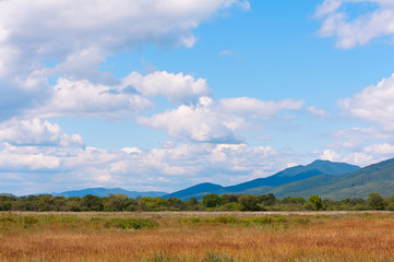 Obraz premium Landscape with mountain views, blue sky and beautiful clouds.