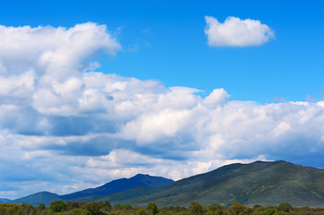 Obraz na płótnie Canvas Landscape with mountain views, blue sky and beautiful clouds.