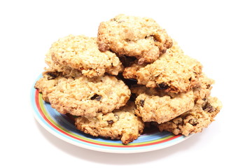 Oatmeal cookies with raisins on colorful plate