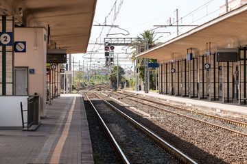 Fototapeta na wymiar Train Station with train tracks