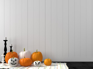 Funny pumpkin against a white wall