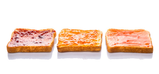 Mix fruit, blueberry, orange fruit jam spread on bread toast