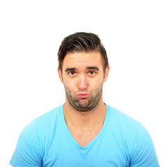 Fototapeta premium Portrait of clueless man against white background
