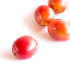 fresh raw coffee beans on white background