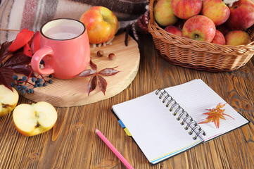 Autumn still life with a cup of cocoa.