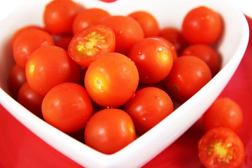 Cherry tomatoes close up. Vibrant red.