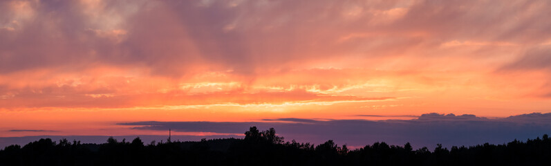 Fototapeta na wymiar Panoramic photo of vibrant sunset