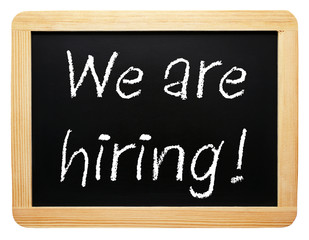 Obraz premium We are hiring ! - Wooden chalkboard on white background