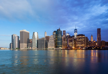 Fototapeta premium Montage of Manhattan skyline night to day - New york - USA