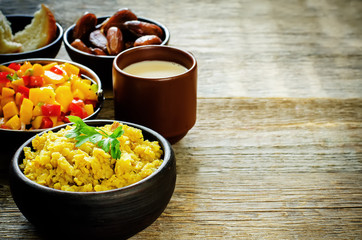 red lentils with curry and dates and a salad of mango and tomato