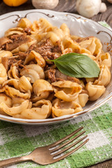 Pork stew with mushrooms, basil and red pepper.