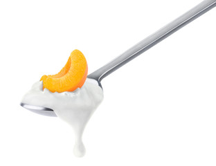 Fototapeta na wymiar Isolated yogurt. Spoon of peach or apricot yogurt isolated on white, with clipping path