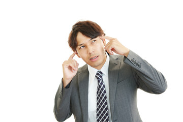 頭痛を訴えるビジネスマン